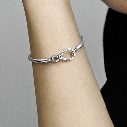 Snake chain sterling silver bracelet with infinity clasp